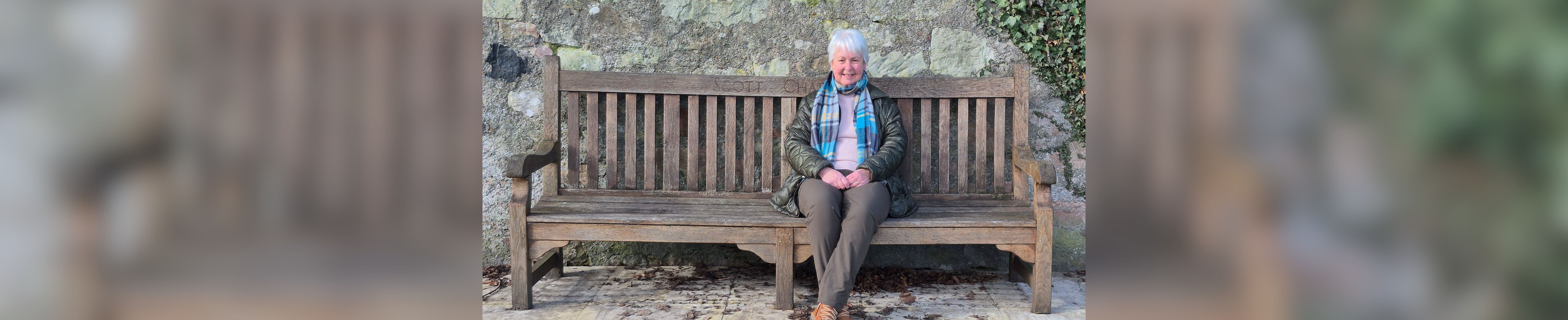 Verity Mutch sat on a bench