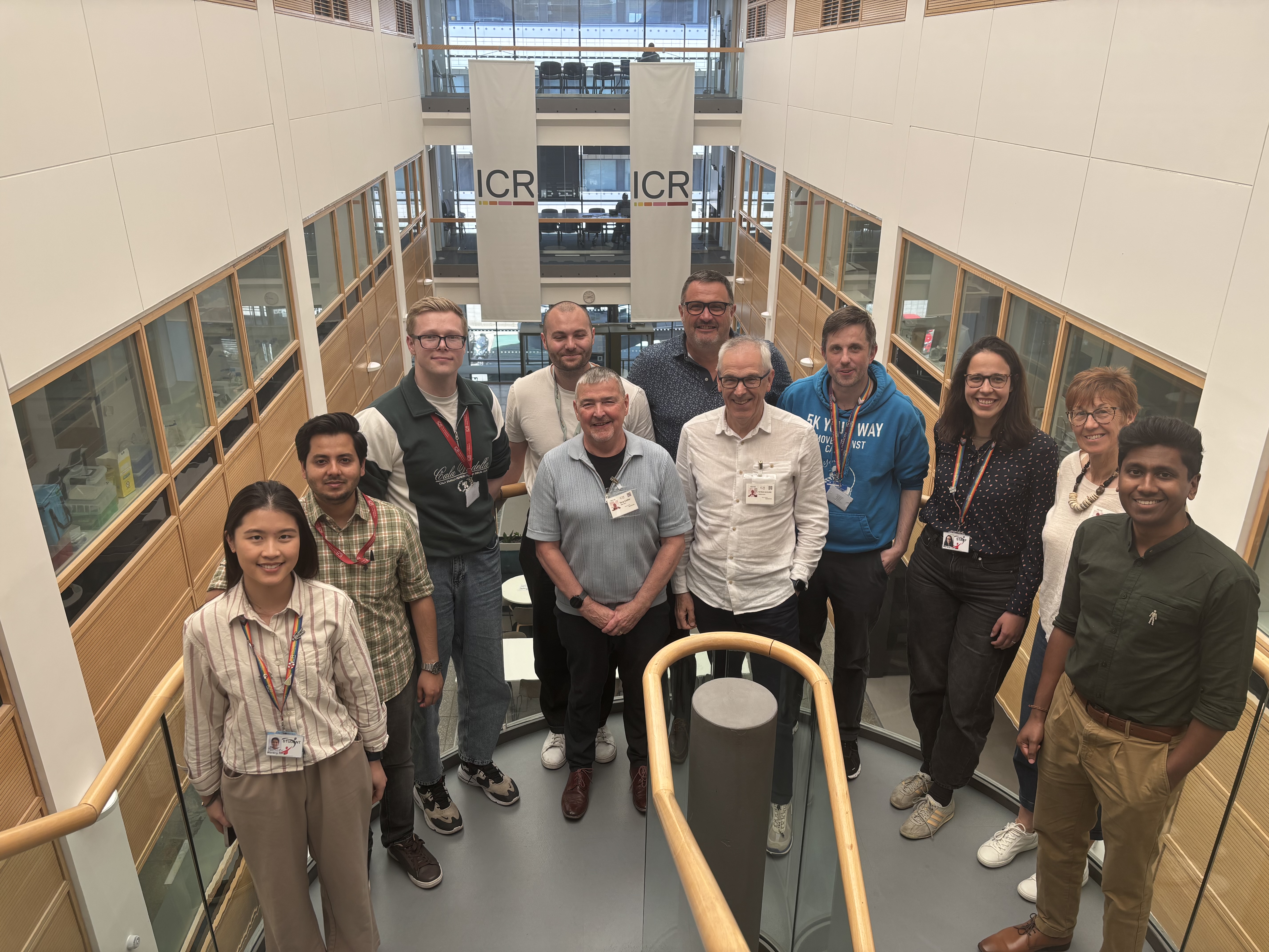 Researchers standing on the stairs at the ICR
