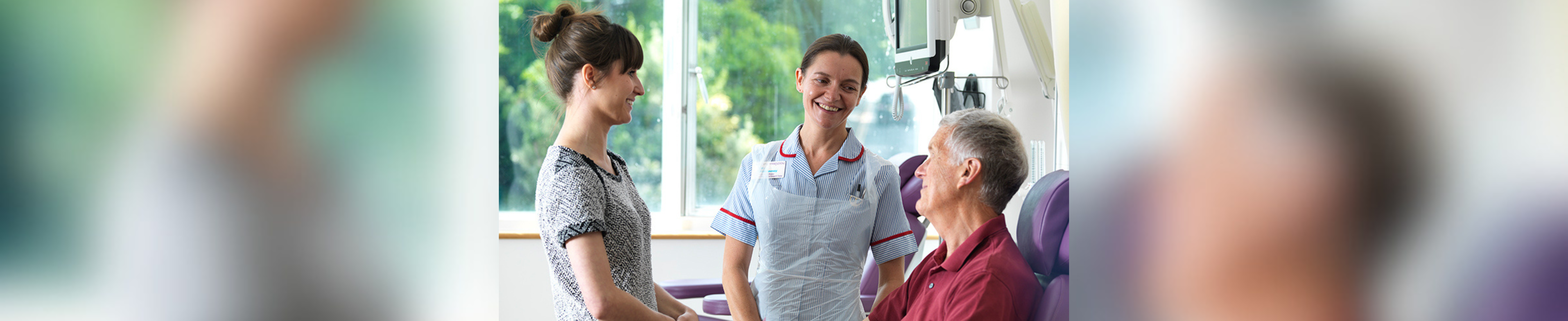 Nurse talking to patient in hospital