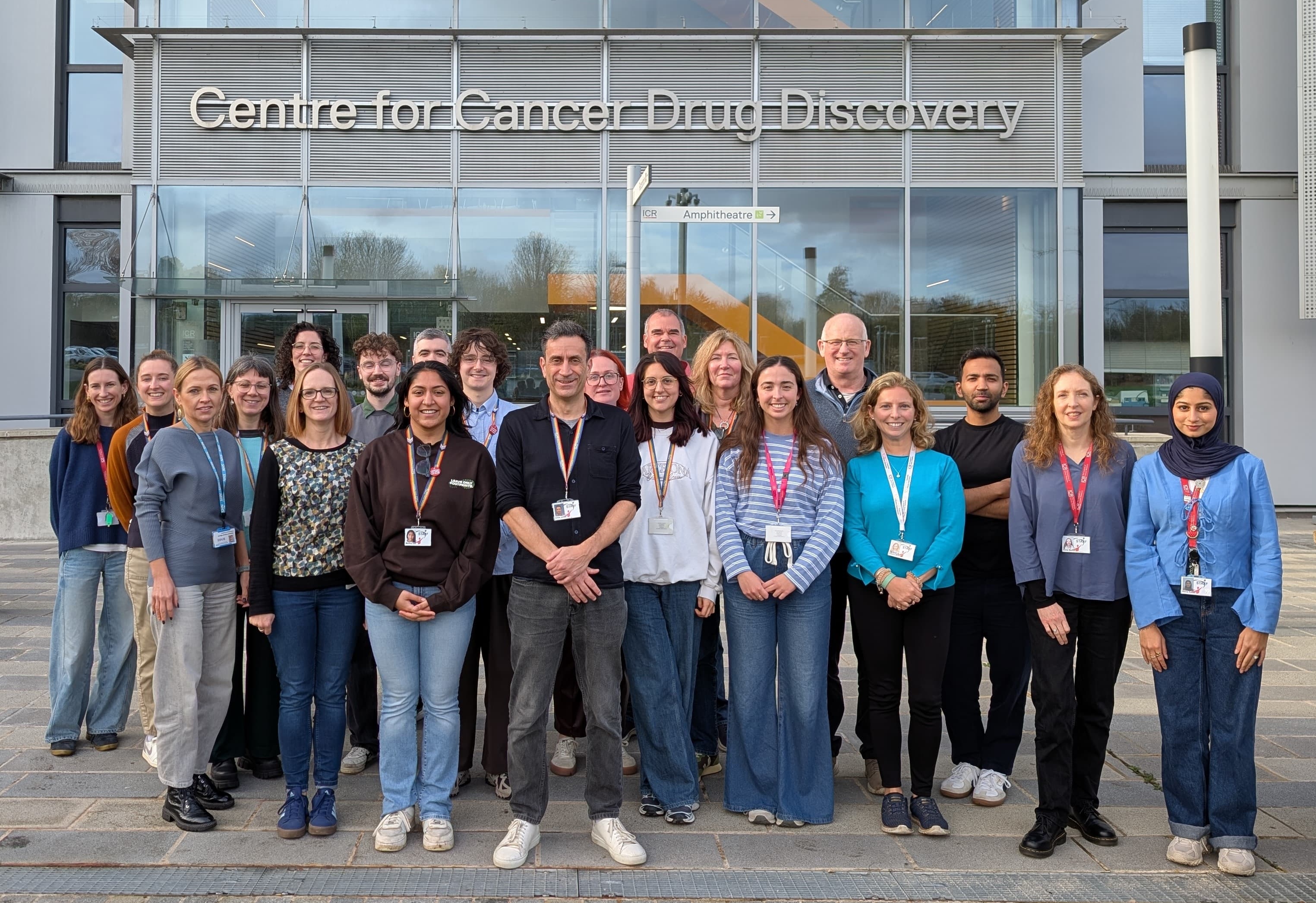 A picture of Professor Chris Jones and scientists from his team standing outside the Centre for Cancer Drug Discovery