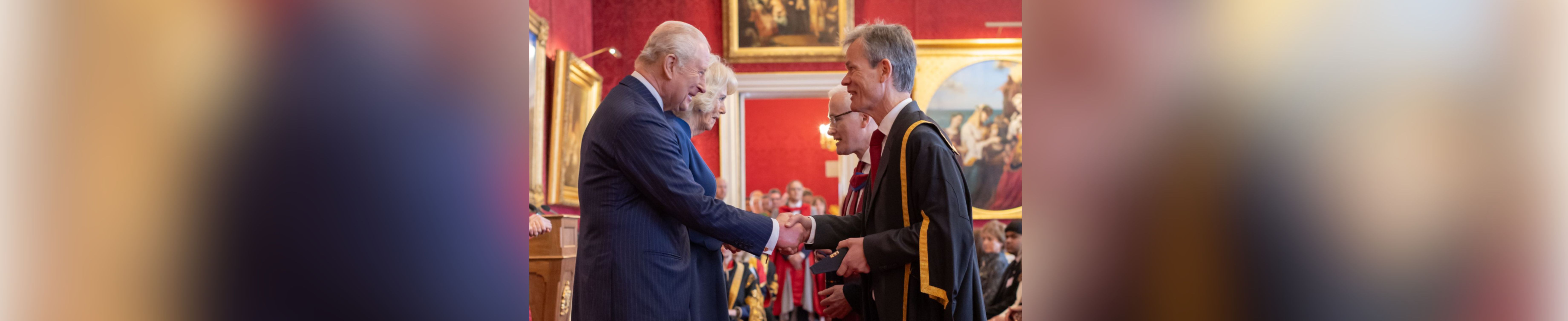 King Charles presenting Professor Kristian Helin with the Queen Elizabeth Prize