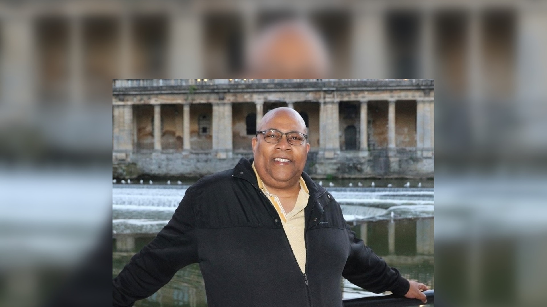 Alfred Samuels smiling into the camera