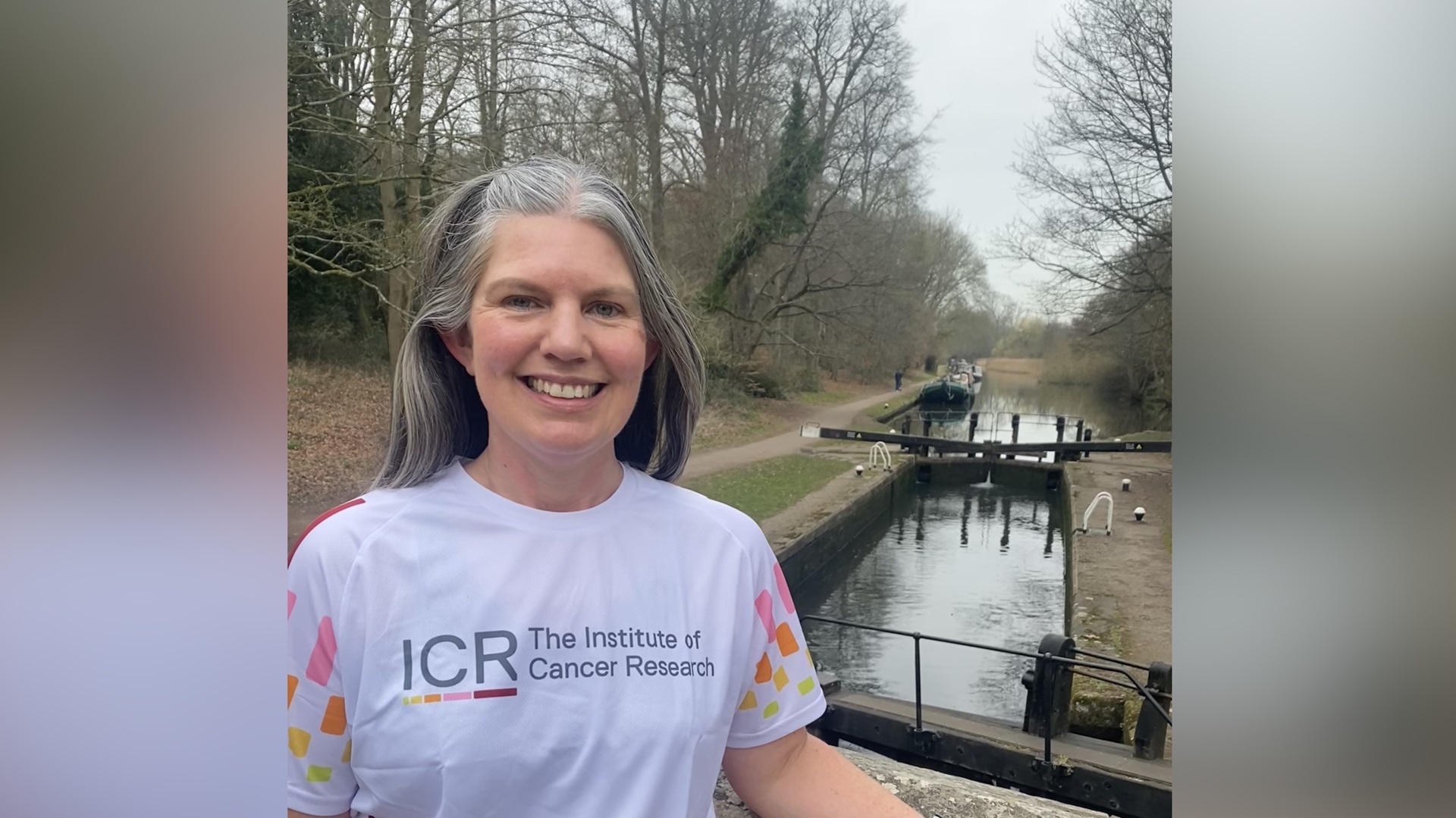 Mary Nassiri wearing an ICR t-shirt by a canal