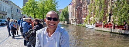 Chris Talebi smiling by a canal