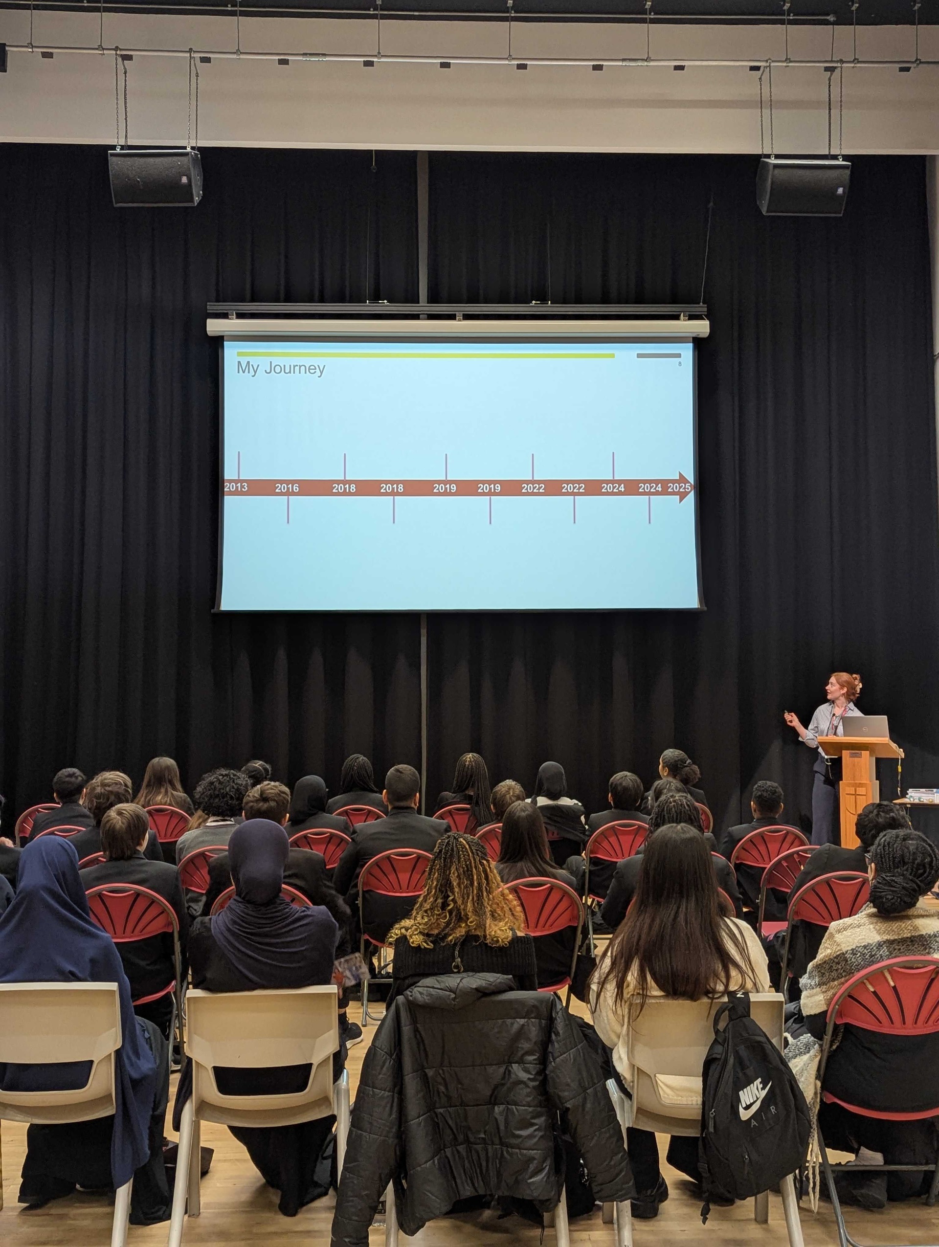 Iona giving a talk to school children