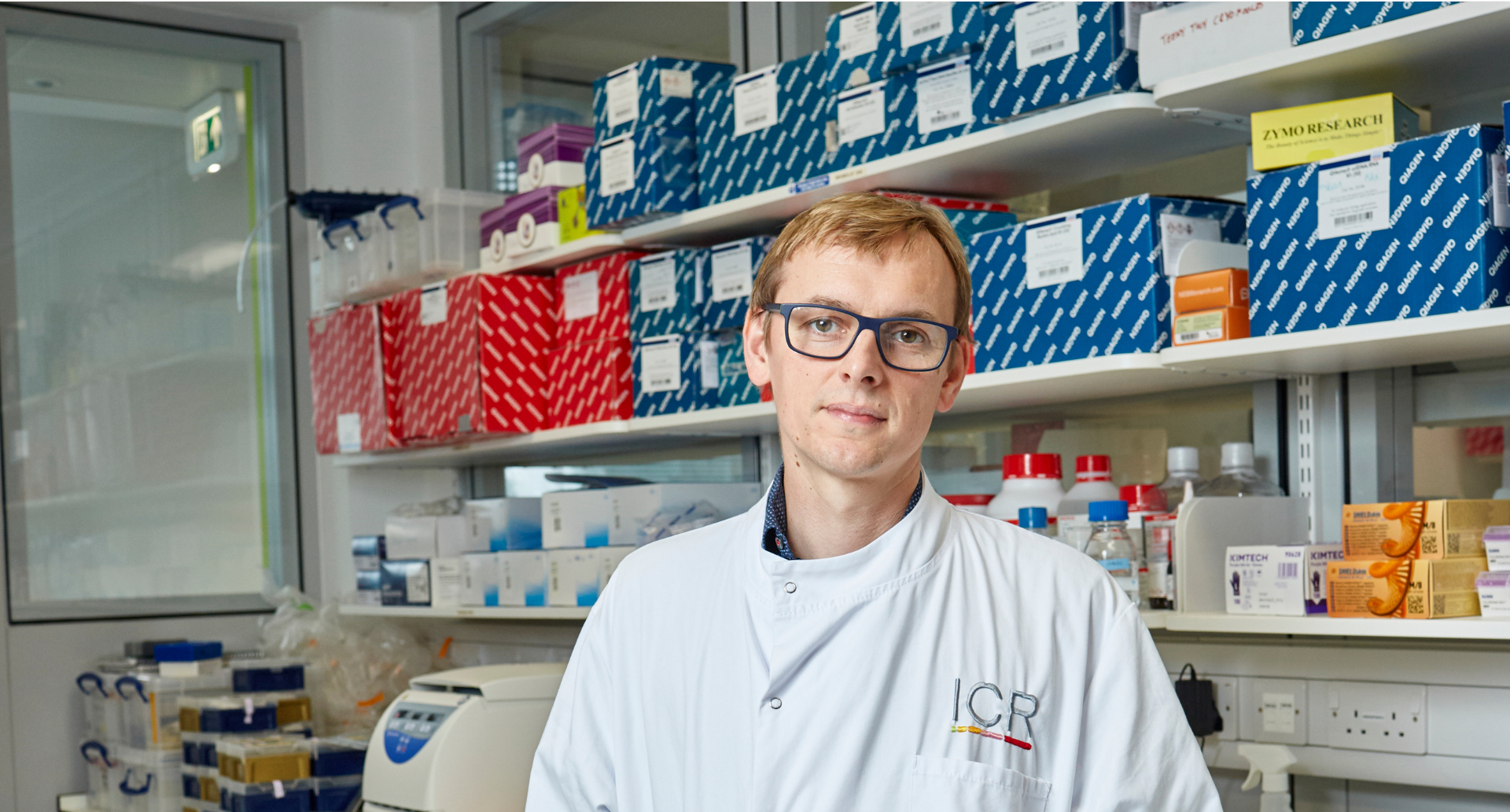 Headshot of Trevor Graham in the lab, wearing an ICR lab coat