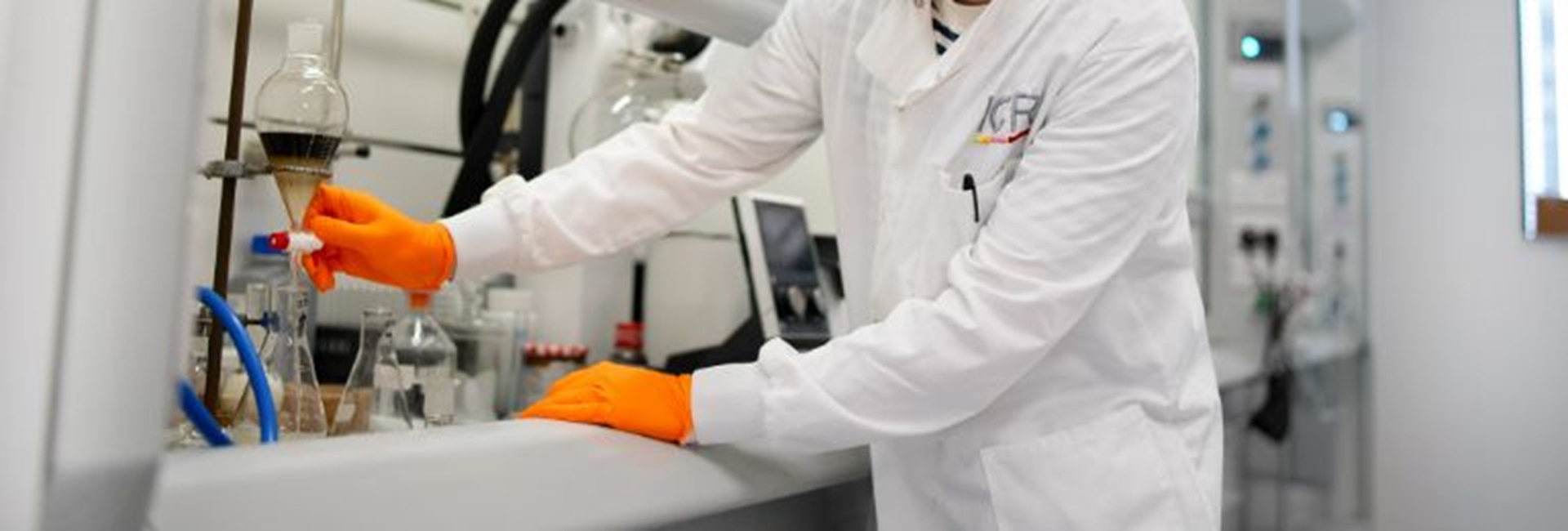 Scientist working in fume hood