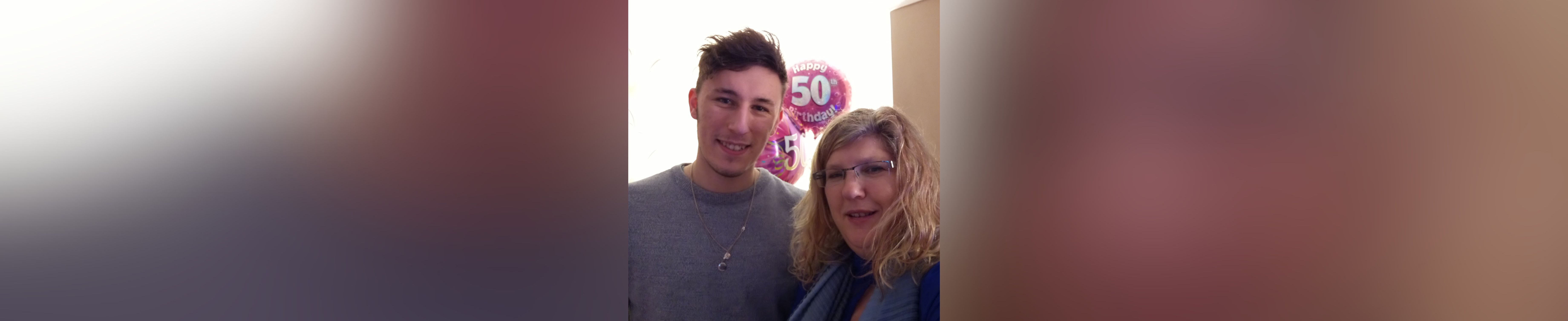 Bradley and Caroline smiling into camera