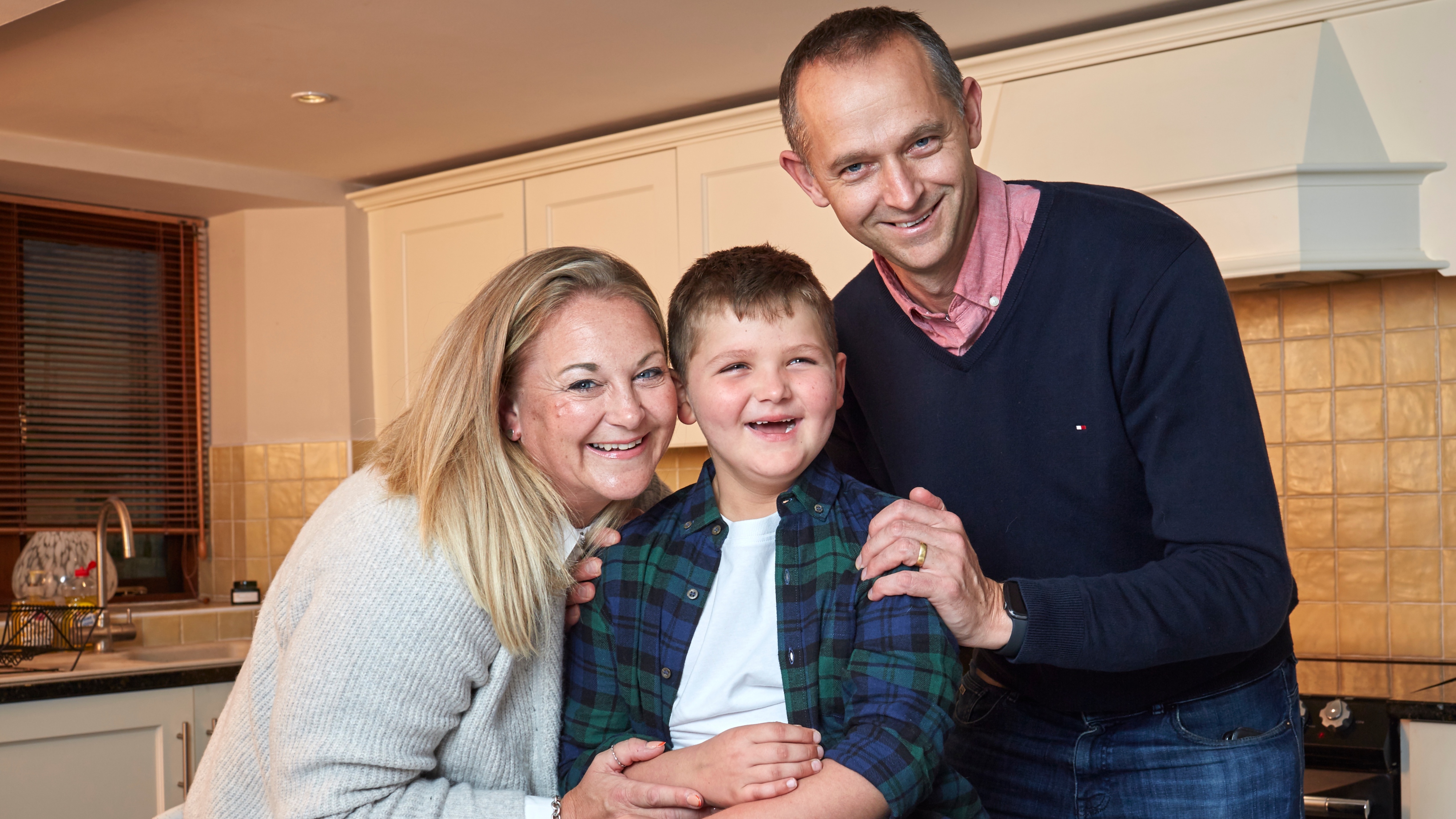 Tommy Edwards with his parents, Jo and Chris