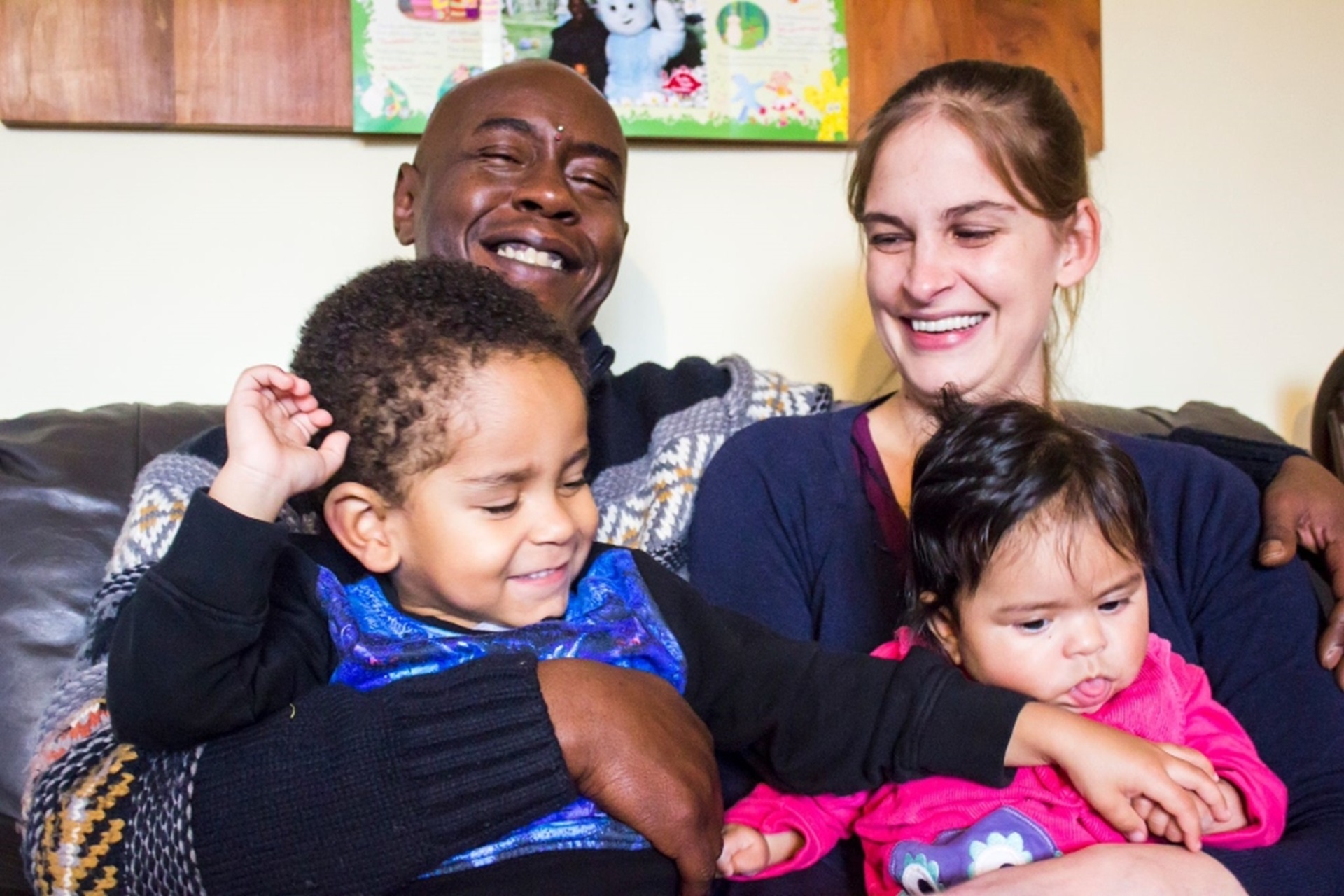 Chris Nelson with his wife, Rachel, and children, Blaise and Asha